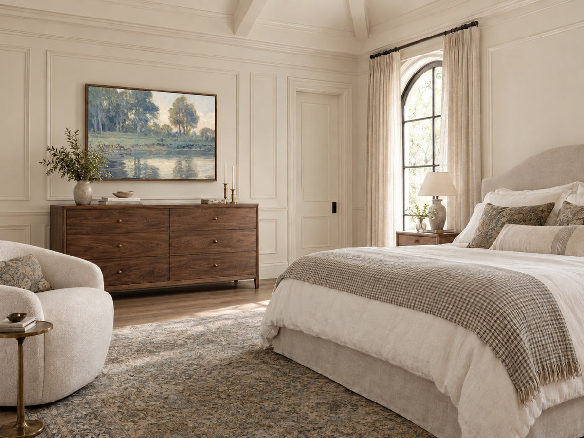 Where the Deer Comes to Drink framed wall art in a bedroom above a walnut dresser
