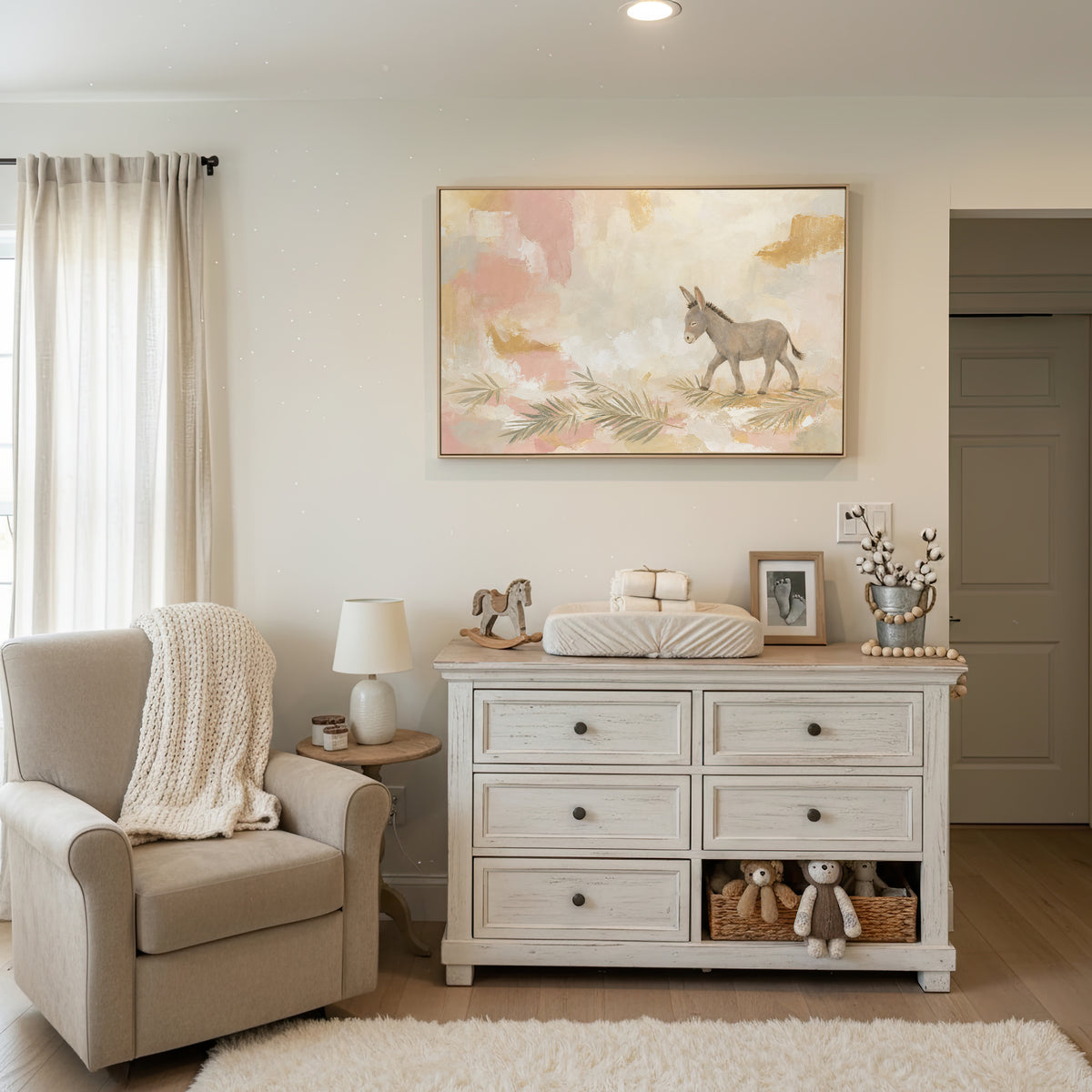 Palm Sunday Donkey wall art in a bright white nursery