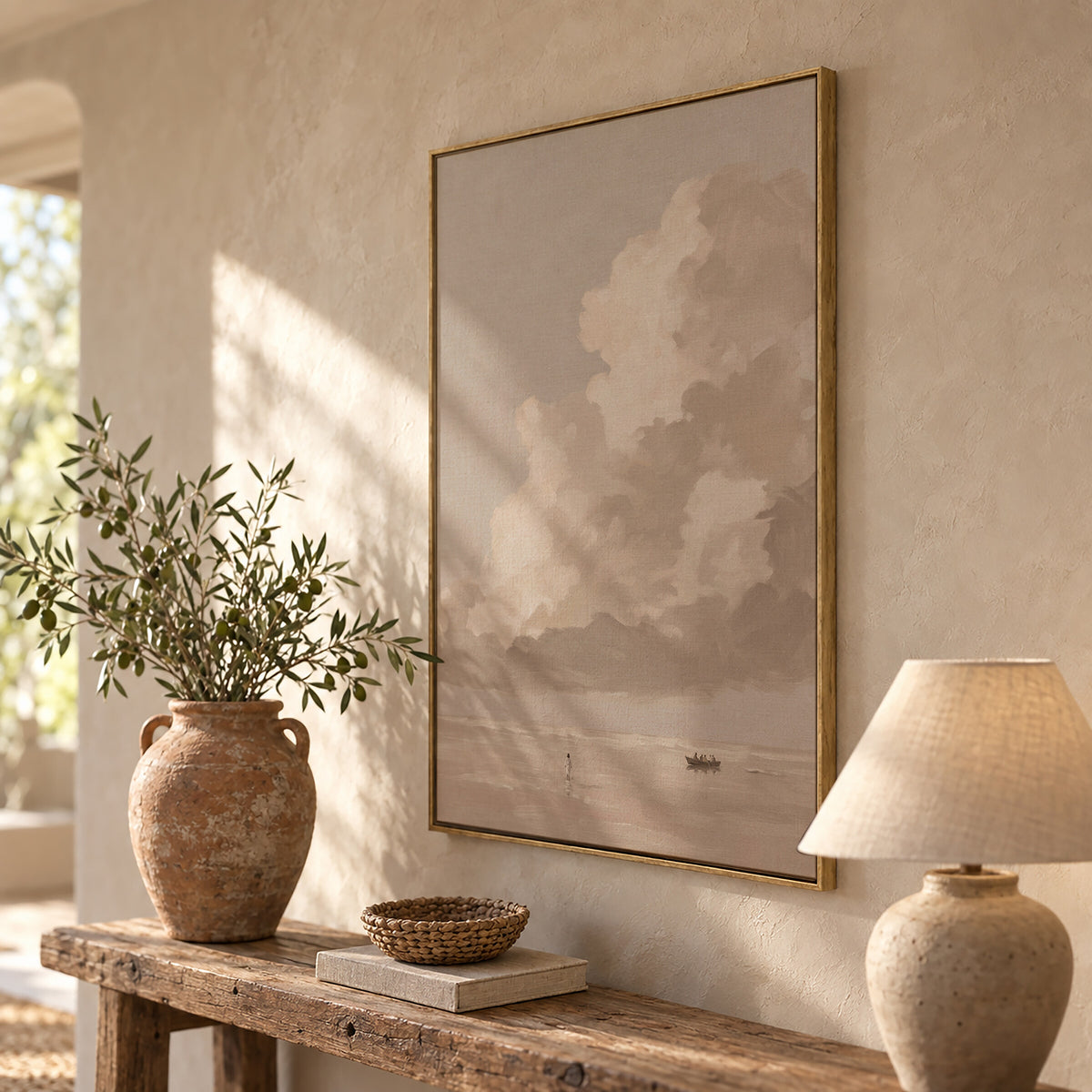 One Cloud Over the Water framed wall art above a rustic console with a lamp