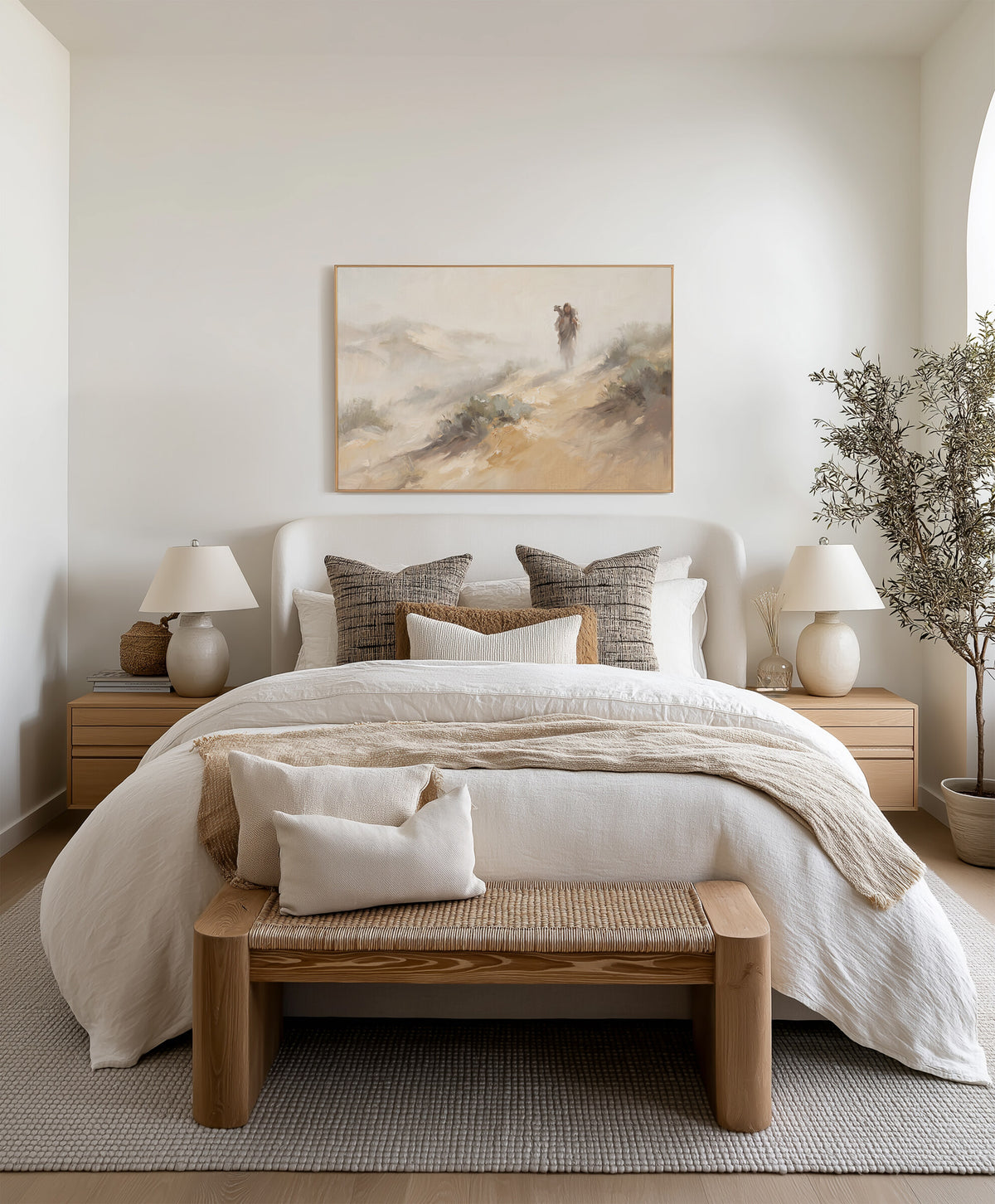 Carrying the Lamb Down the Dune framed wall art above the bed in a bright bedroom