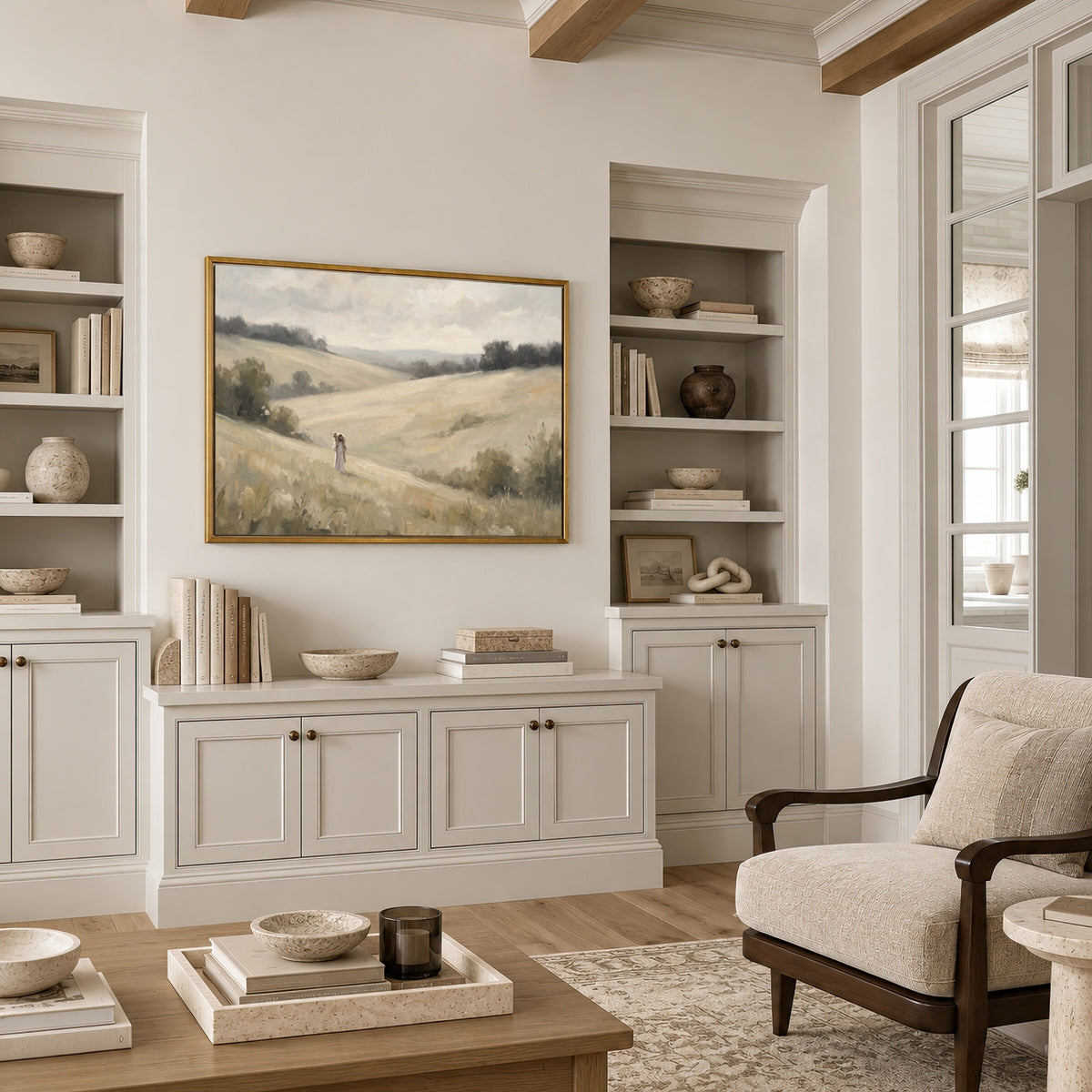 Carried Home Over the Hills framed wall art in a neutral living room with built-ins