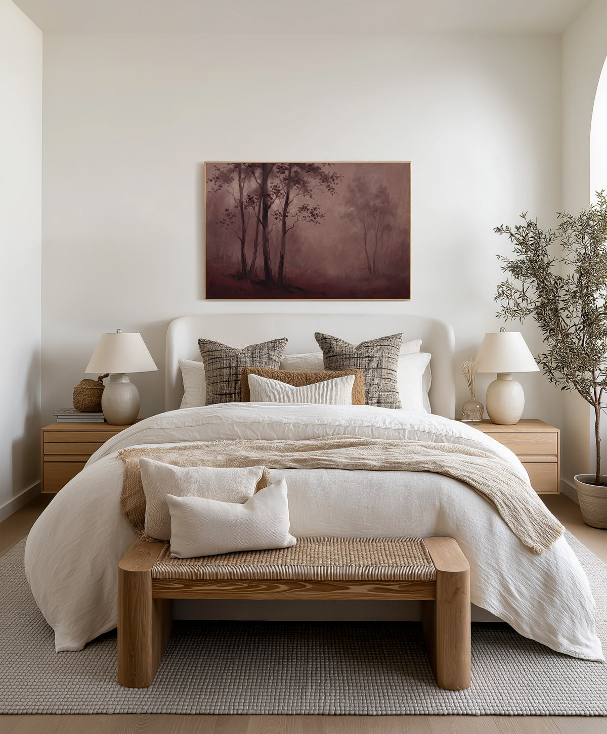 Burgundy Forest in Mist framed wall art above the bed in a bright bedroom