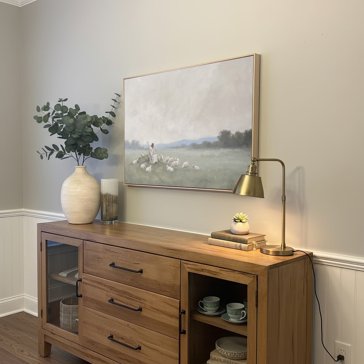Resting with the Flock wall art in a styled room
