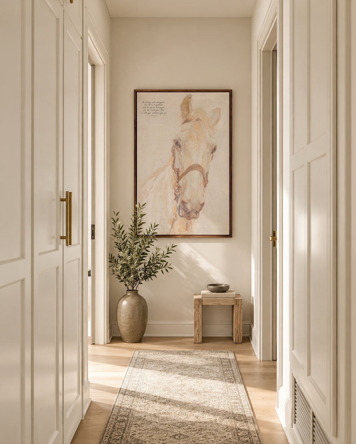 Be Strong, White Horse framed wall art in a soft neutral hallway