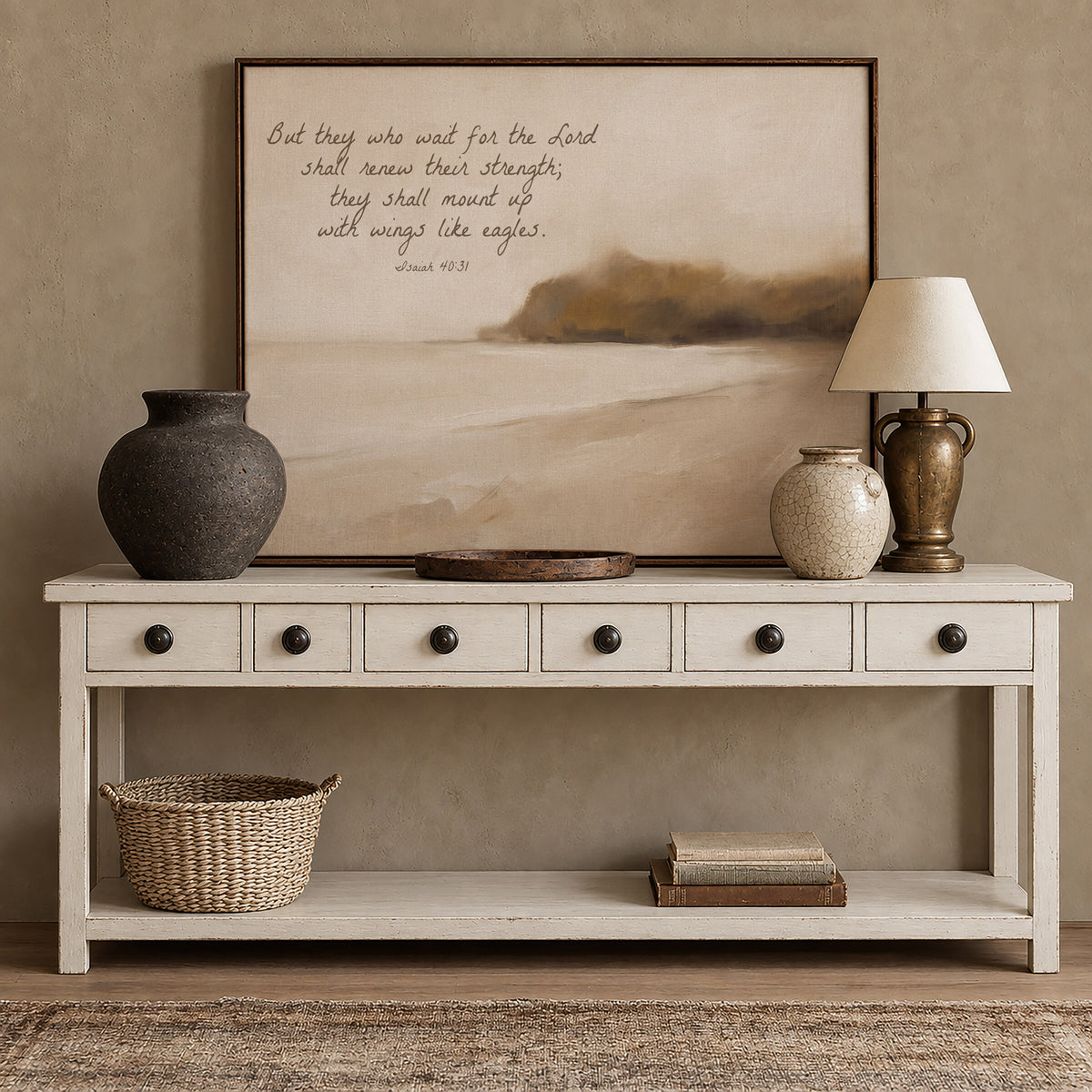 Wings Like Eagles Headland framed wall art above a white console with brass accents