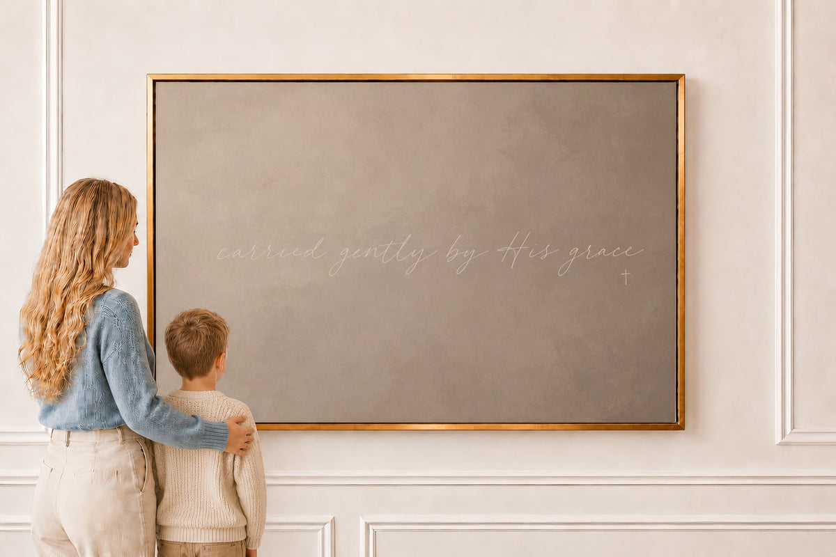 Carried Gently by His Grace — Scripture Wall Art in a gold frame