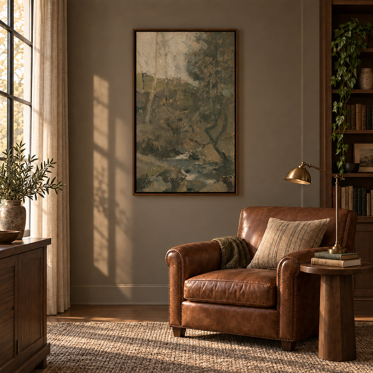 Living Water in the Autumn Ravine framed wall art in a cozy study with a leather armchair