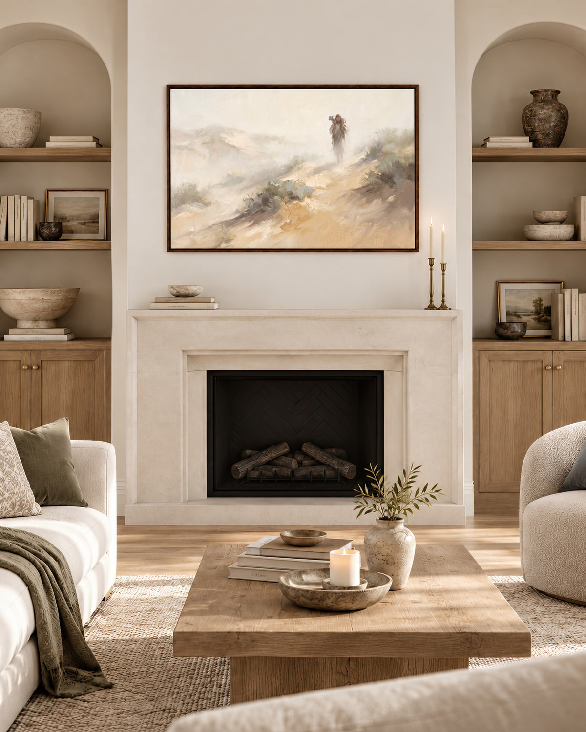 Carrying the Lamb Down the Dune framed wall art above a fireplace in a living room