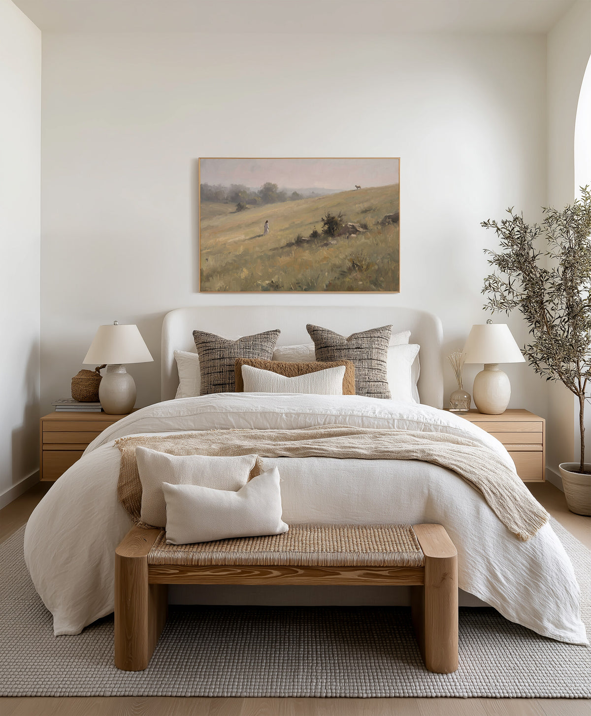 The One on the Ridge framed wall art above the bed in a bright bedroom
