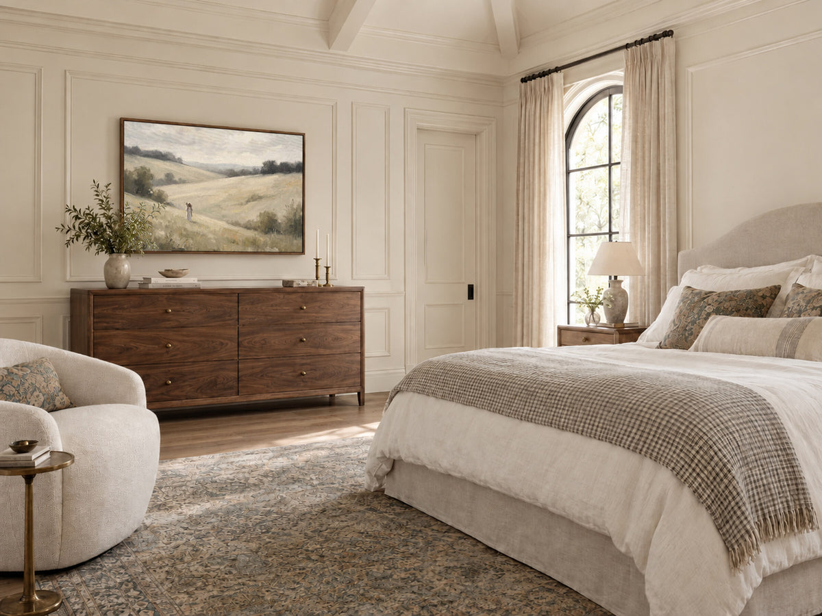 Carried Home Over the Hills framed wall art in a bedroom above a walnut dresser