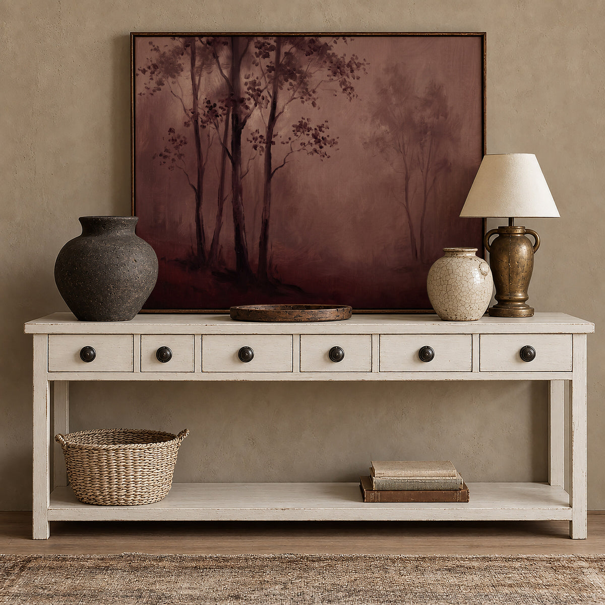 Burgundy Forest in Mist framed wall art above a white console with brass accents