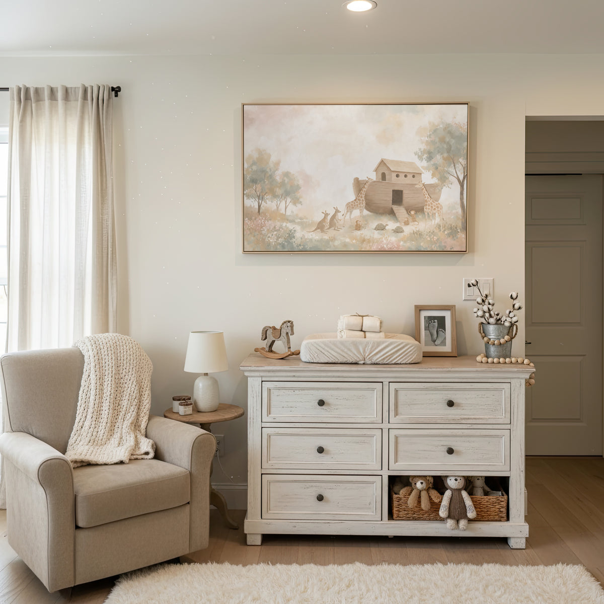 The Ark And The Giraffes wall art in a bright white nursery