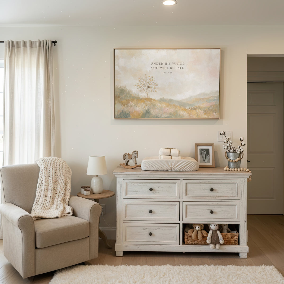 Under His Wings You Will Be Safe (Landscape) wall art in a bright white nursery