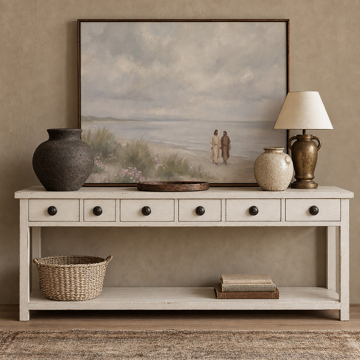 Walking the Shore Together framed wall art above a white console with brass accents