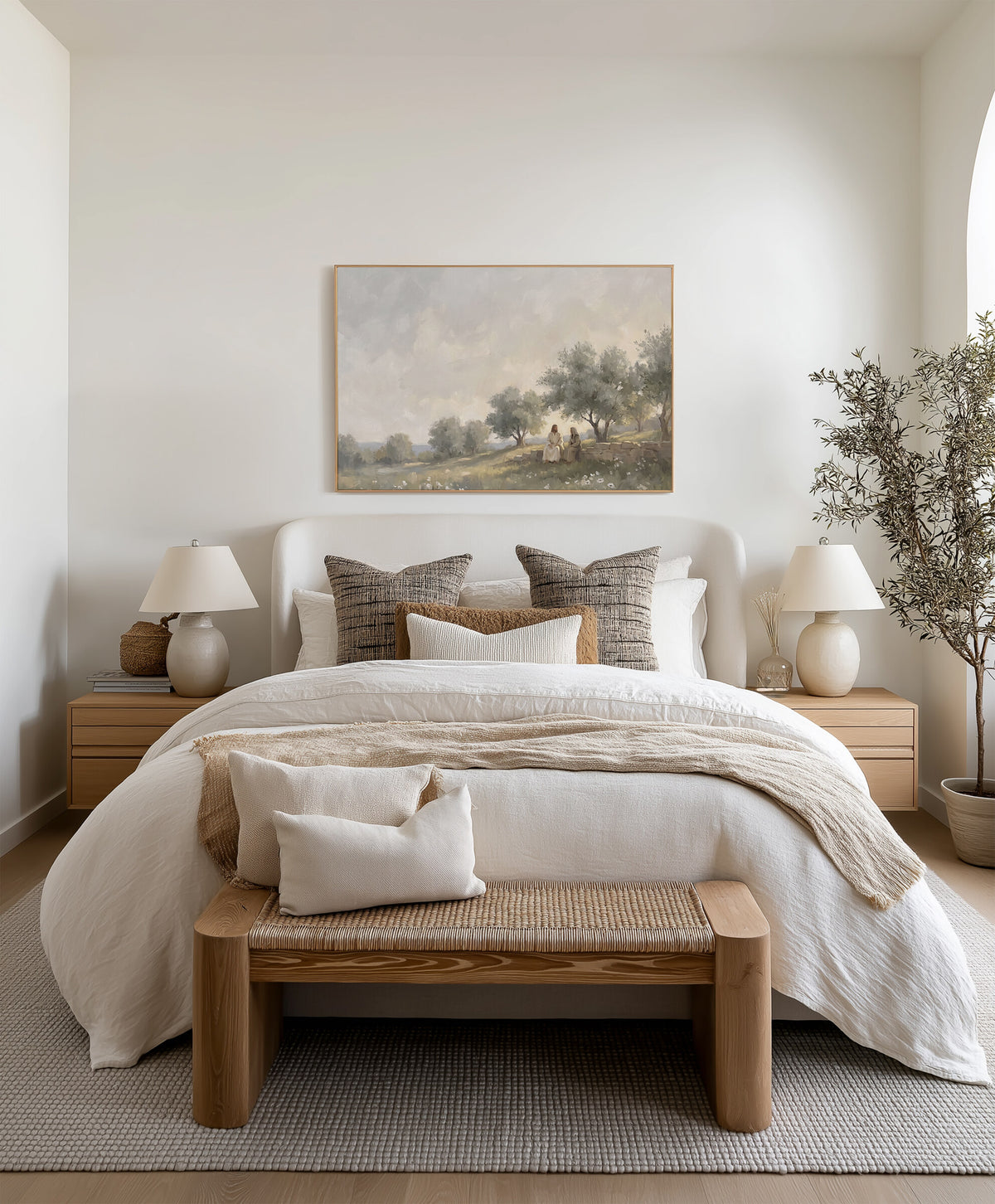 Seated Among the Olive Trees framed wall art above the bed in a bright bedroom
