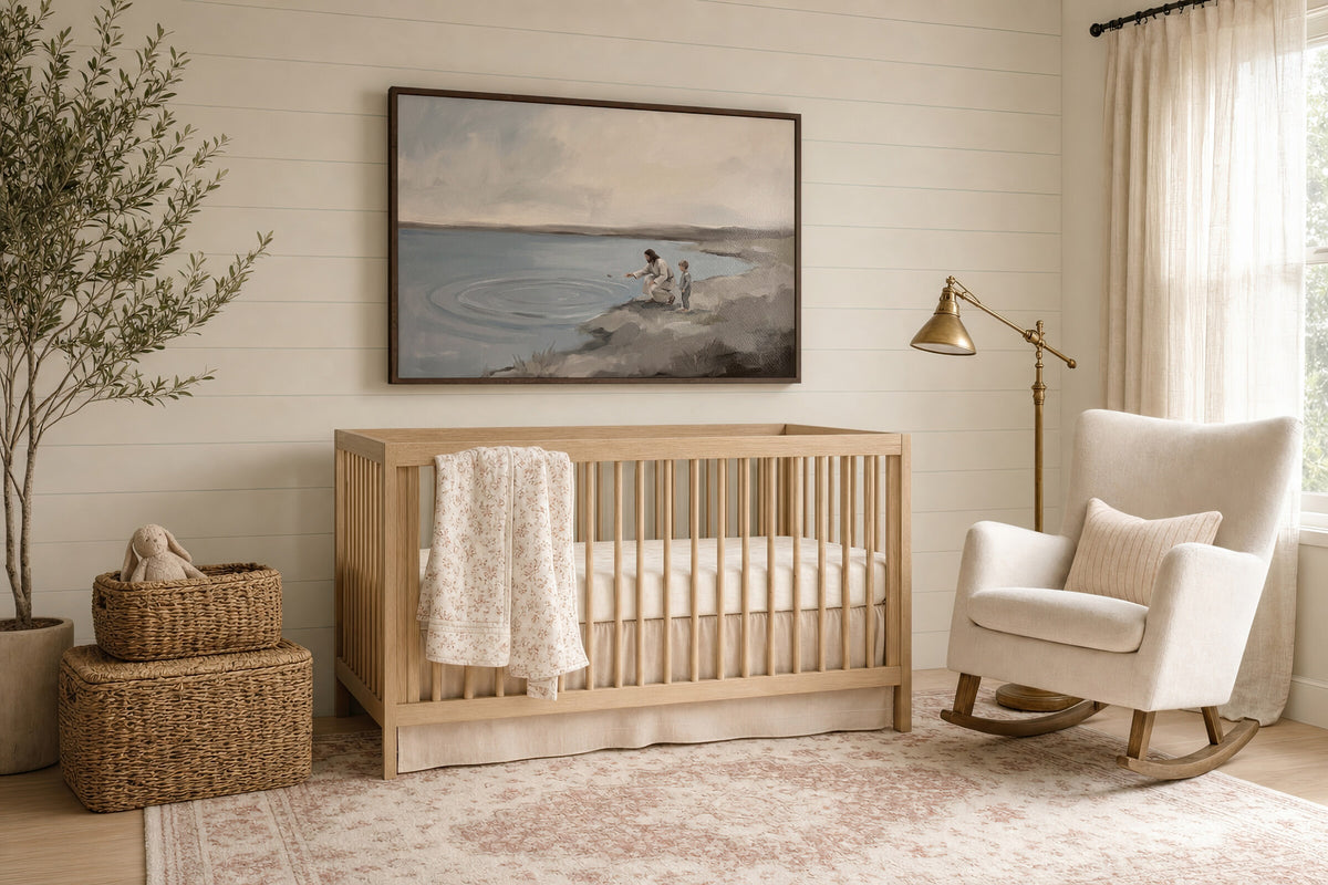 Skipping Stones with Jesus framed wall art in a soft nursery beside the crib