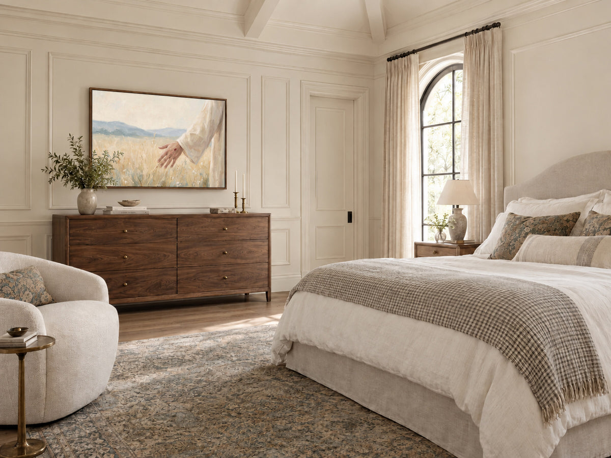 Hand Brushing the Wheat framed wall art in a bedroom above a walnut dresser